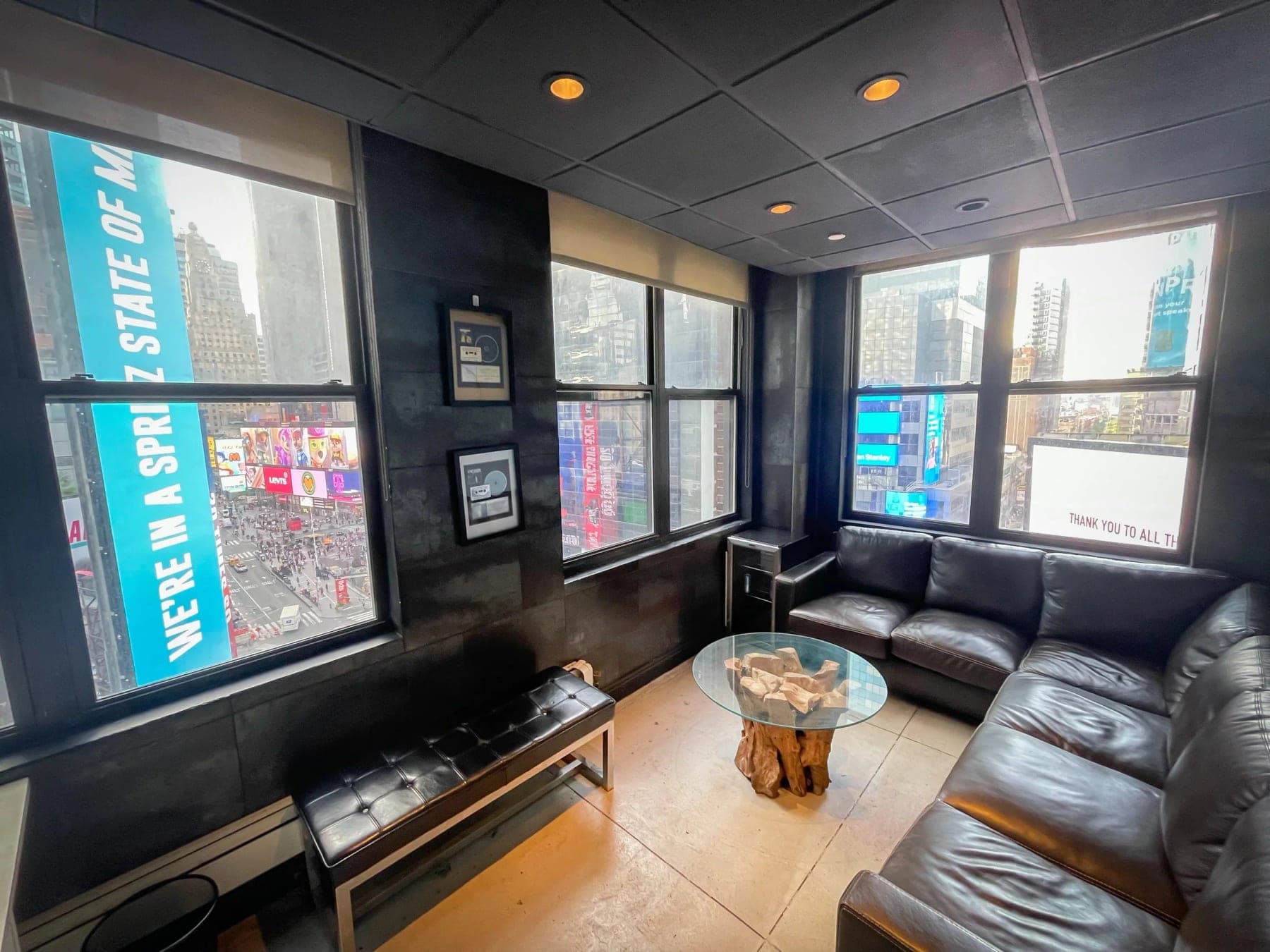 The Studio Q1 lounge, with Times Square billboards through the windows