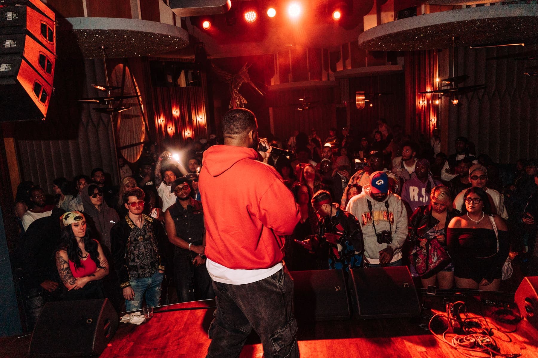 Performer eye to eye with the crowd at The Peppermint Club